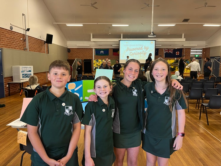 4 RVPS students who participated in the HPAG program. They are all wearing their newly awarded HPAG pins